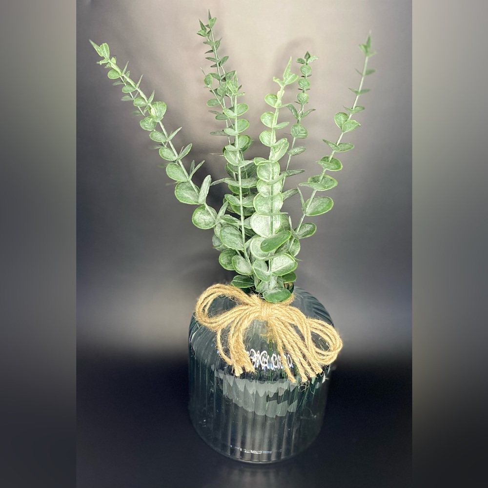 Faux Eucalyptus Centerpiece in a Blue Tinted Textured Vase with Burlap Bow